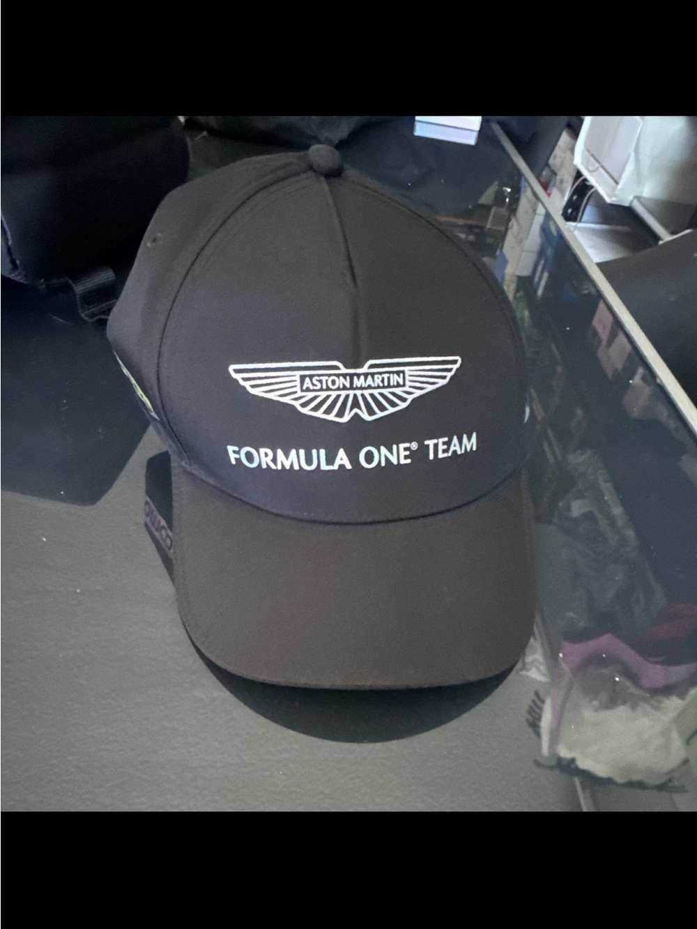 Black Baseball Cap with Green Aramco Tag